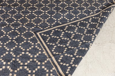 Lot 431 - A diamond pattern durrie