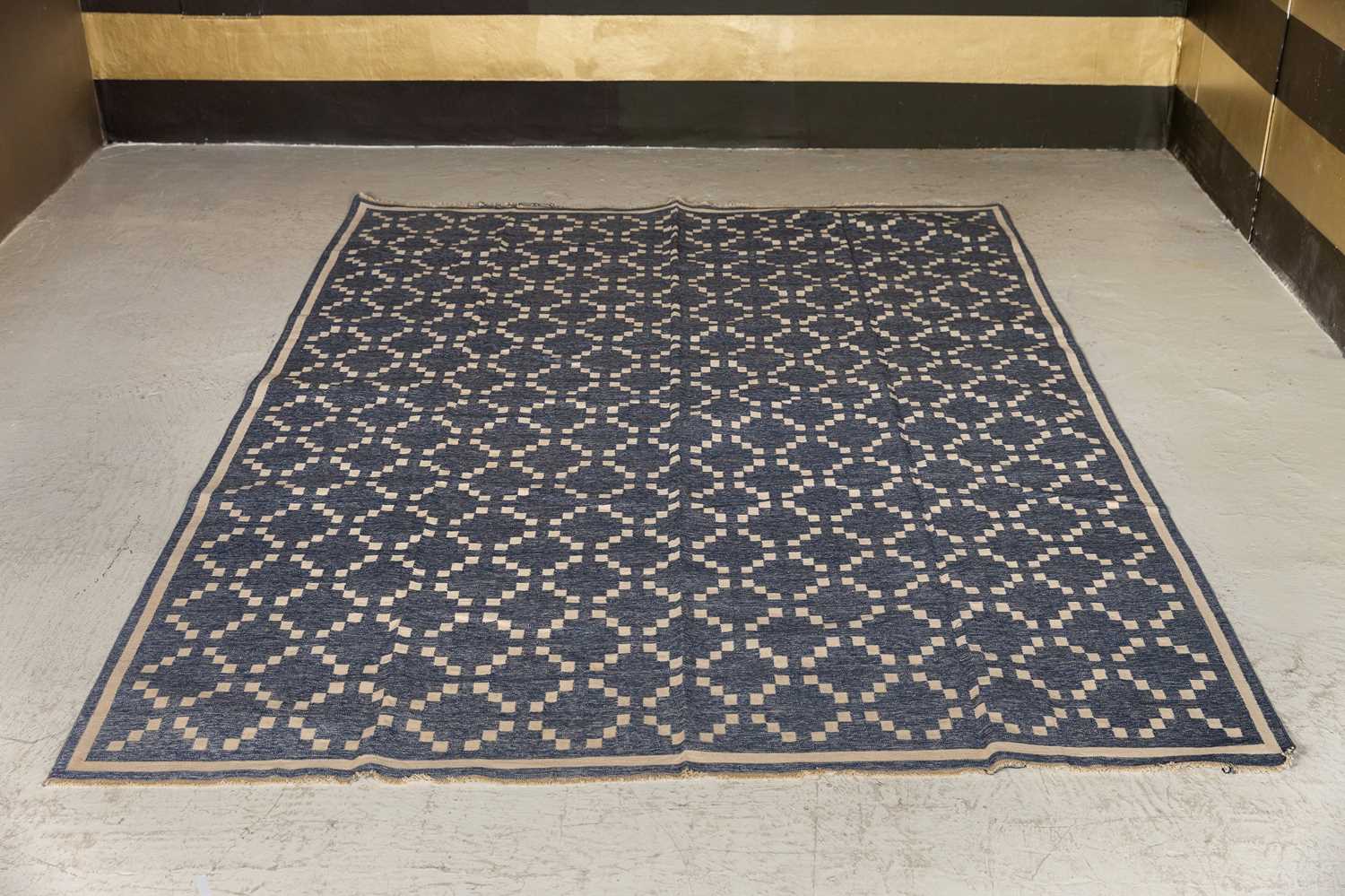 Lot 431 - A diamond pattern durrie