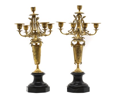 Lot 316 - A pair of gilt metal candelabra