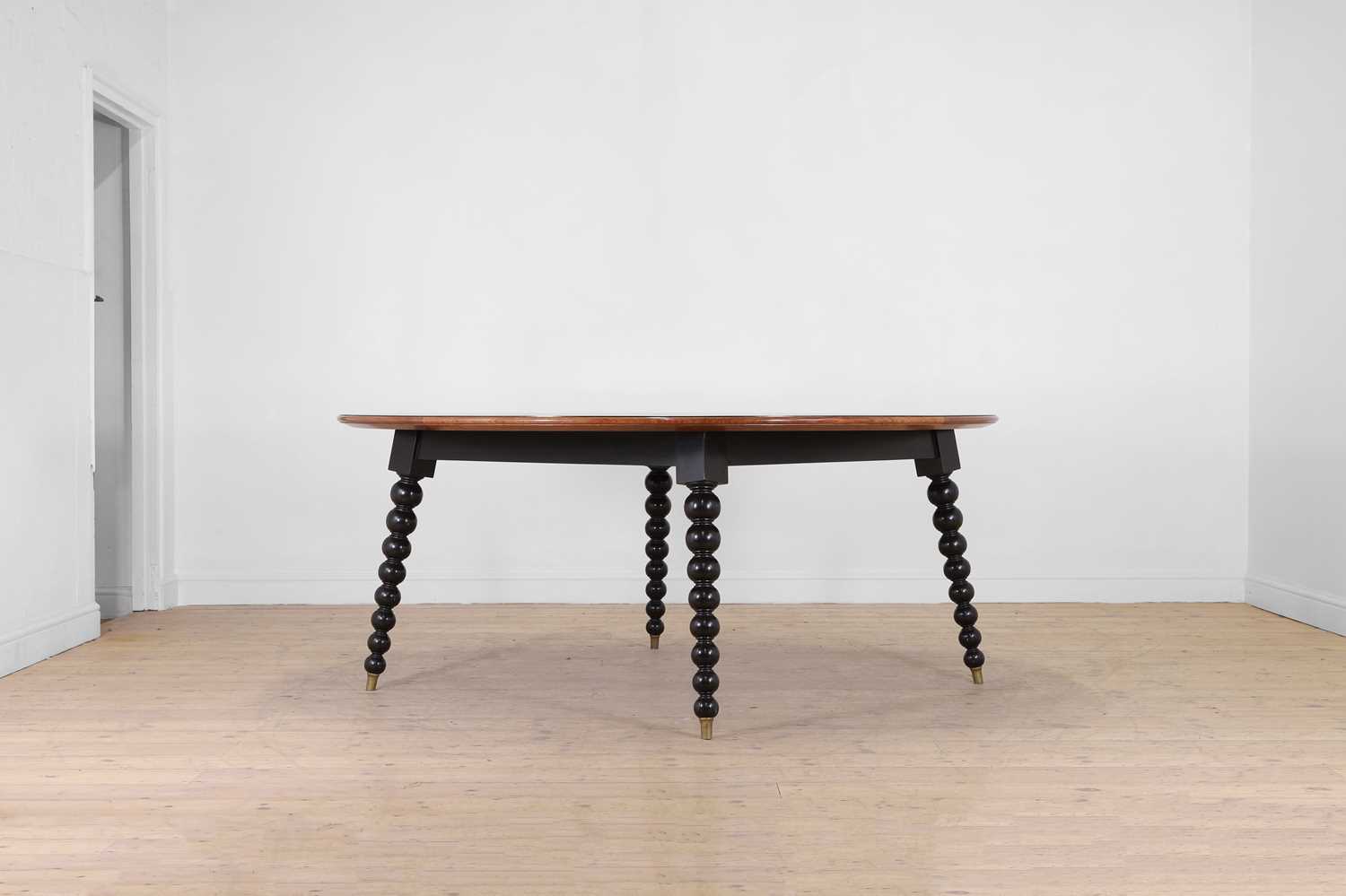 Lot 286 - A large ash and ebony-inlaid centre table by Chester Jones