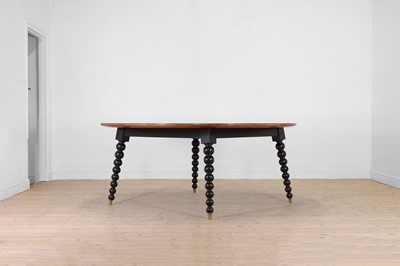 Lot A large ash and ebony-inlaid centre table by Chester Jones