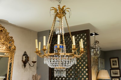 Lot 171 - A neoclassical gilt-bronze and cut-glass basket chandelier