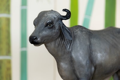 Lot 127 - A painted plaster model of a cow