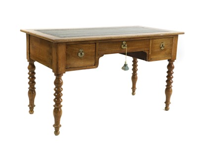 Lot 627 - A fruitwood desk