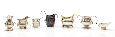 Lot 48 - A collection of six silver cream jugs