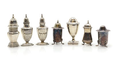 Lot 22 - A group of silver pepperettes