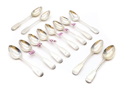 Lot 21 - A group of twelve silver fiddle pattern teaspoons