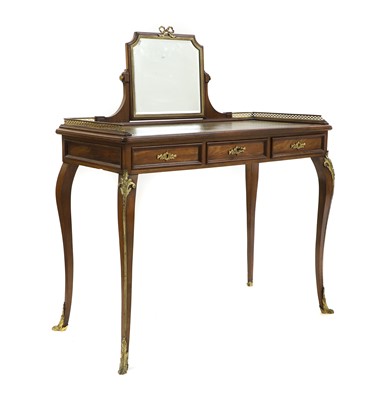 Lot 438 - A French walnut writing table