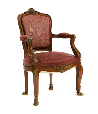 Lot 439 - A French design mahogany and parcel gilt open armchair