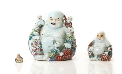 Lot 59 - A porcelain Happy Buddha