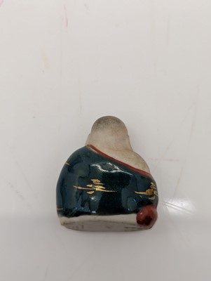 Lot 59 - A porcelain Happy Buddha