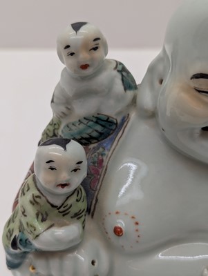 Lot 59 - A porcelain Happy Buddha