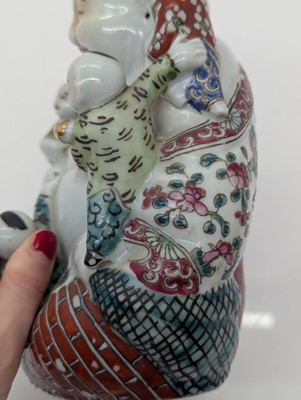 Lot 59 - A porcelain Happy Buddha