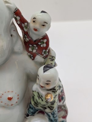 Lot 59 - A porcelain Happy Buddha