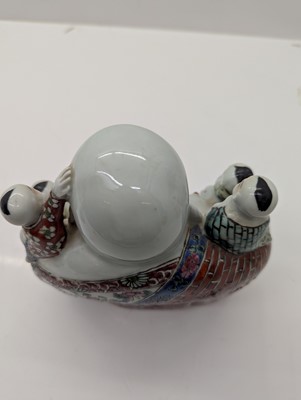 Lot 59 - A porcelain Happy Buddha