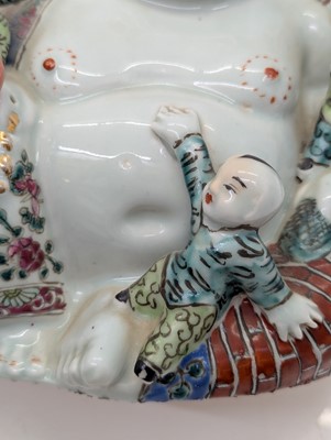 Lot 59 - A porcelain Happy Buddha