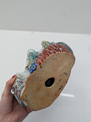Lot 59 - A porcelain Happy Buddha