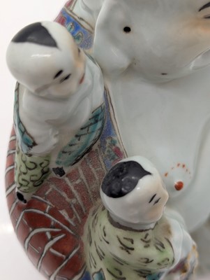 Lot 59 - A porcelain Happy Buddha