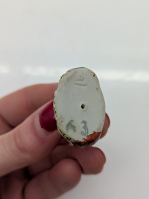 Lot 59 - A porcelain Happy Buddha