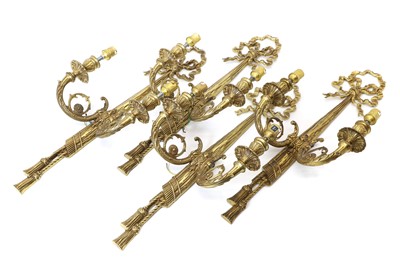 Lot 398 - A set of four twin branch brass wall lights