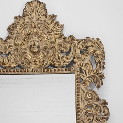 Lot 390 - A large gilt wall mirror