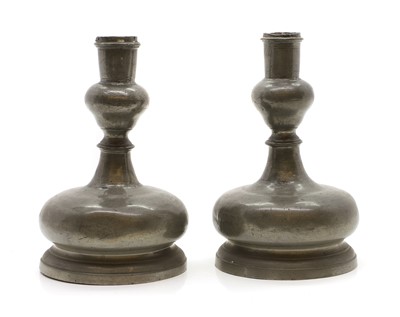 Lot 247A - A pair of pewter candlesticks