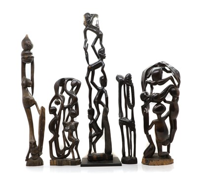 Lot 305 - A group of five carved hardwood Makonde sculptures