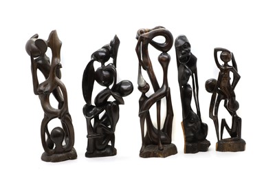 Lot 306 - A group of five carved hardwood Makonde sculptures