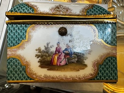 Lot 83 - A porcelain and gilt-metal casket