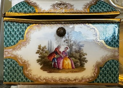 Lot 83 - A porcelain and gilt-metal casket