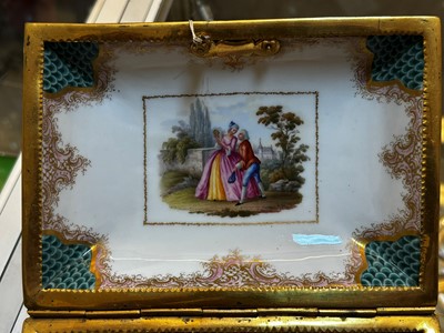 Lot 83 - A porcelain and gilt-metal casket