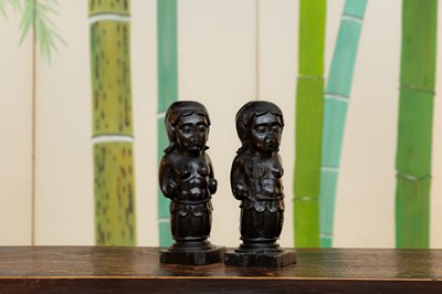 Lot 132 - A pair of ebony figures