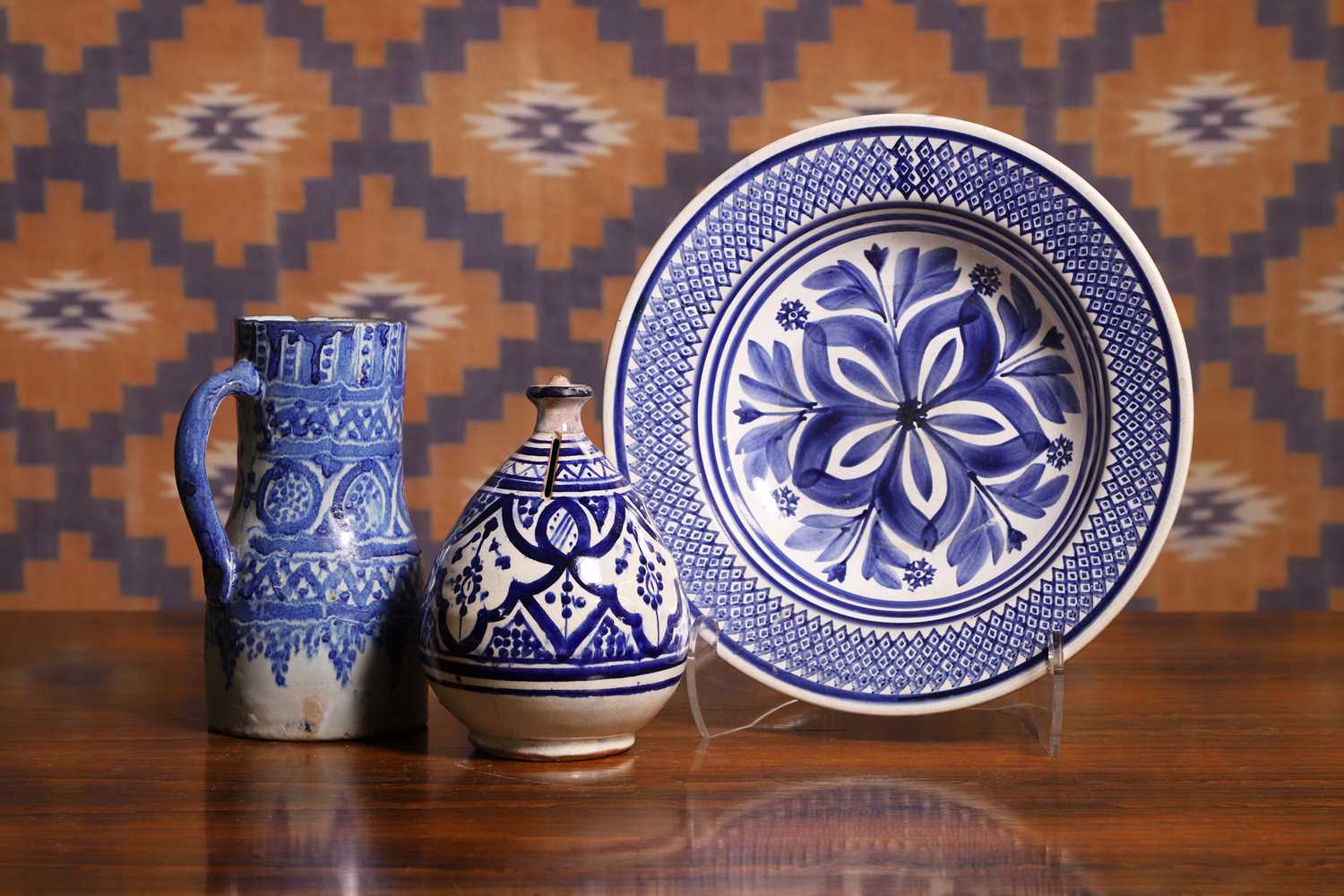 Lot 668 - A group of Moroccan blue and white pottery