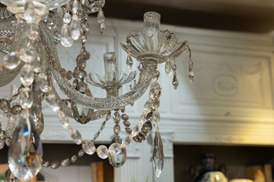 Lot 186 - A large crystal glass twelve-light chandelier