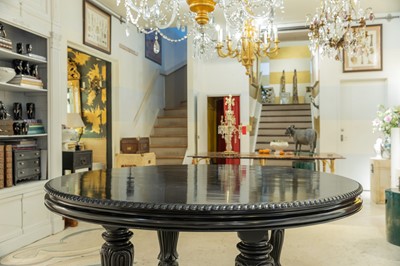 Lot 407 - A large ebonised mahogany centre table