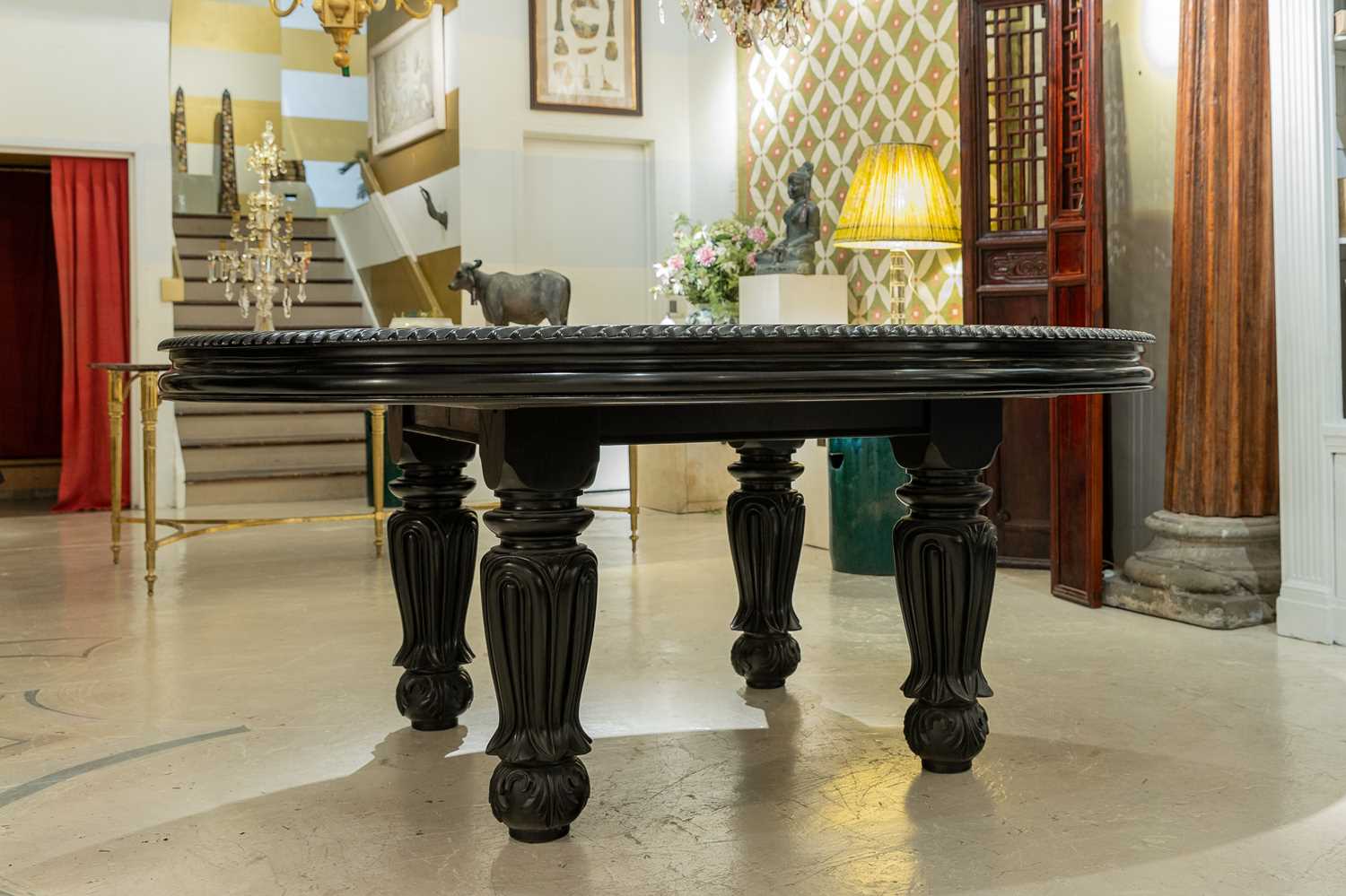 Lot 407 - A large ebonised mahogany centre table