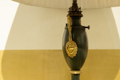 Lot 48 - A pair of Empire ormolu-mounted toleware table lamps