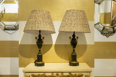 Lot 48 - A pair of Empire ormolu-mounted toleware table lamps