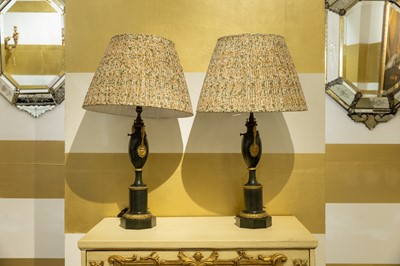 Lot 48 - A pair of Empire ormolu-mounted toleware table lamps