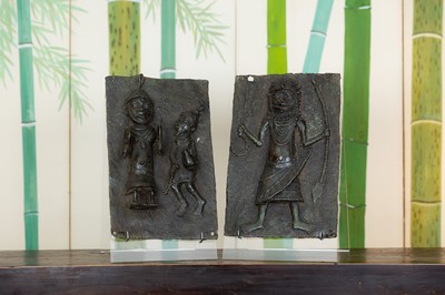 Lot 130 - A pair of bronze plaques