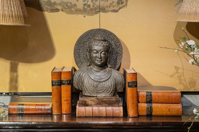 Lot 110 - A carved stone Gandhara-style Buddha