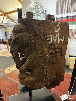 Lot 109 - A pair of carved wooden elephants