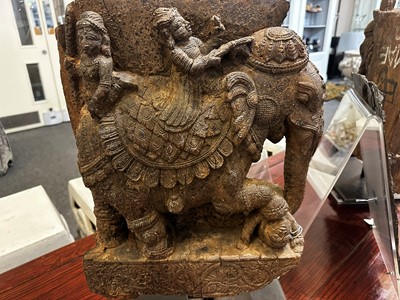 Lot 109 - A pair of carved wooden elephants