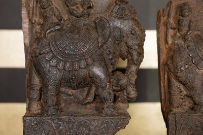 Lot 109 - A pair of carved wooden elephants
