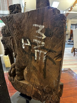 Lot 109 - A pair of carved wooden elephants