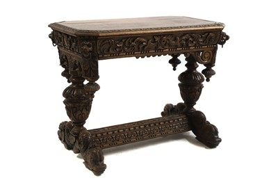 Lot 419 - A mid-Victorian carved oak centre table