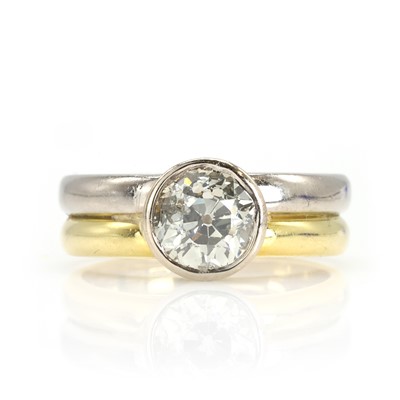 Lot 149 - An 18ct two colour gold diamond single stone ring