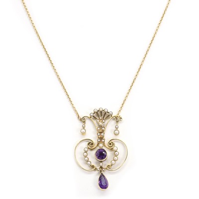 Lot 46 - An Edwardian amethyst and split pearl lavaliere necklace