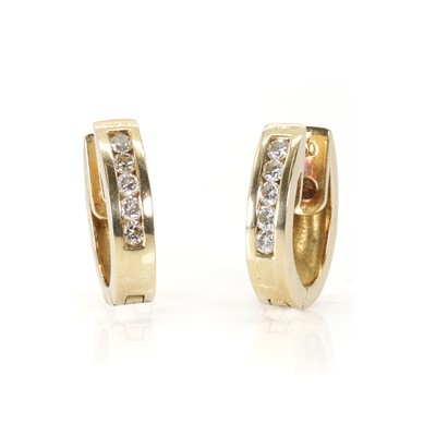 Lot 87 - A pair of diamond oval hoop earrings