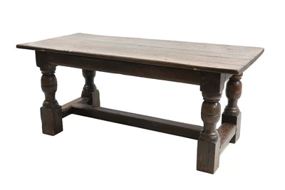 Lot 489 - An oak refectory table